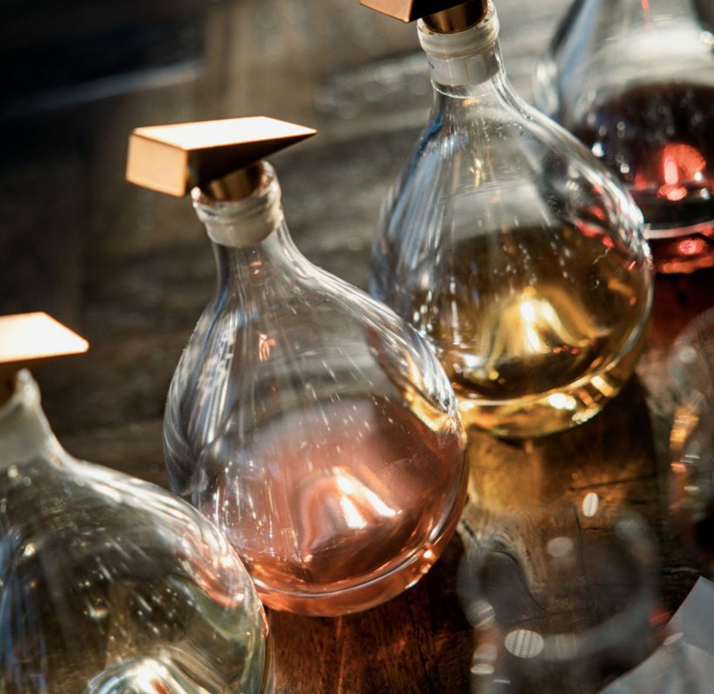 Bottles with different types of liquids in them. 